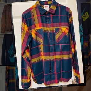 Boy’s Small Plaid buttoned down dress shirt.